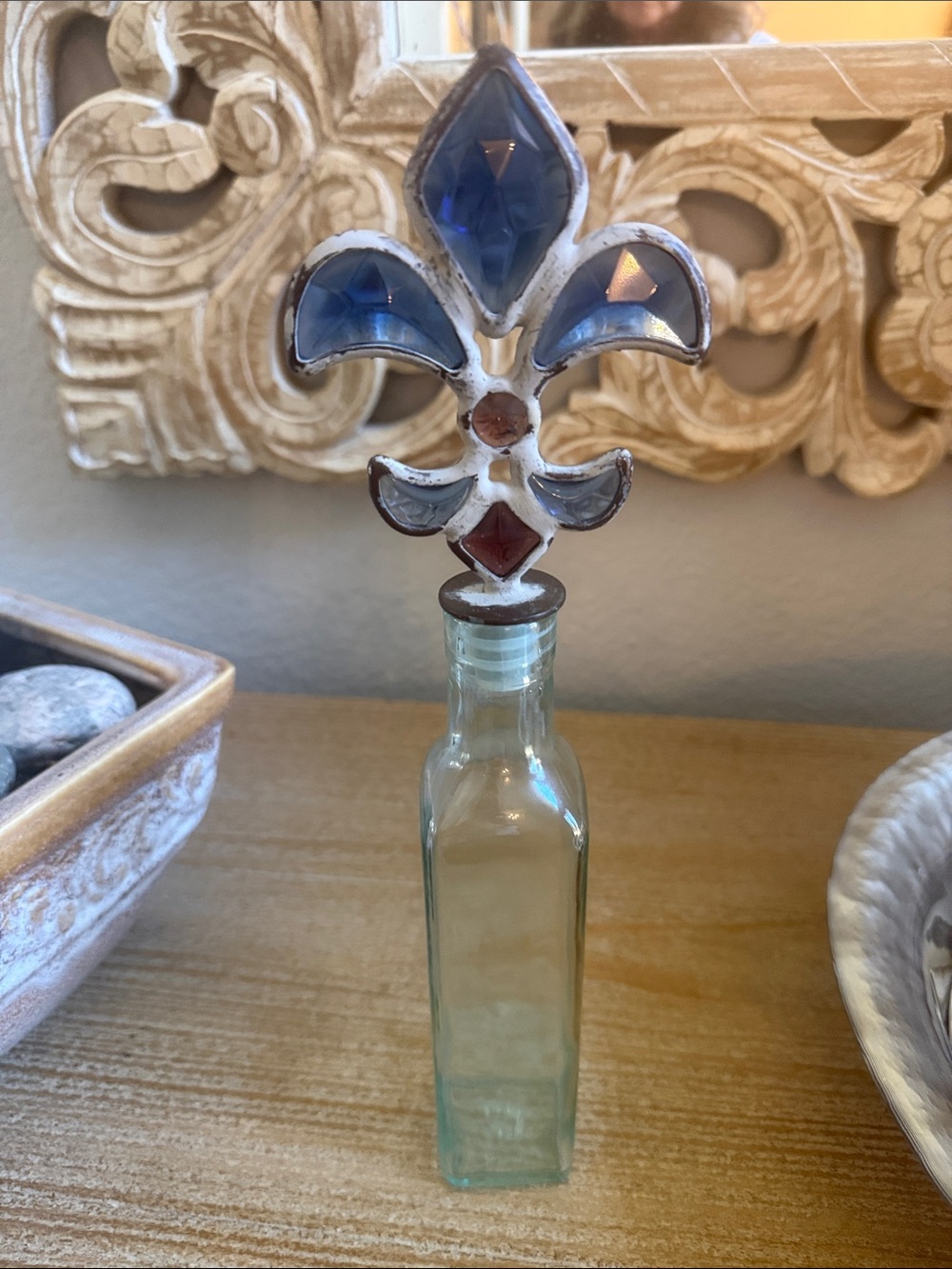 Handcrafted Fleur-de-Lis Bottle Stopper with Blue Accent and Glass Bottle